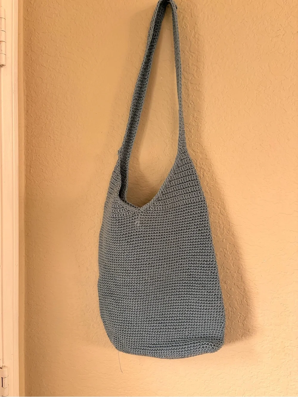 The Sak Light Gray Crochet Crossbody with Logo Charm